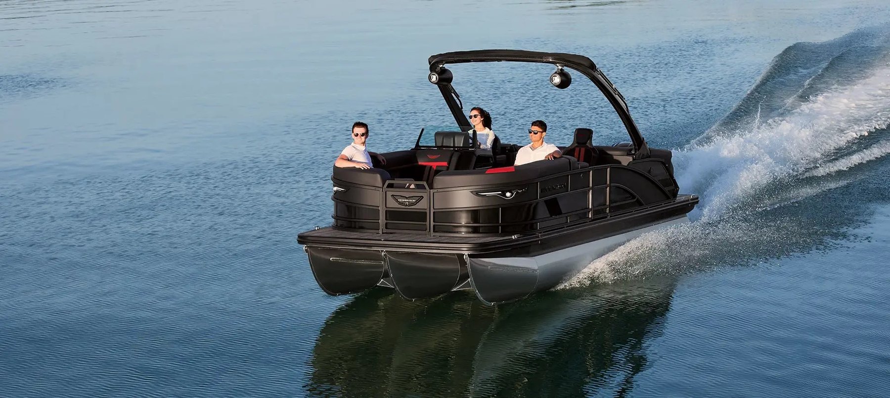 Bennington M Series luxury pontoon on the water